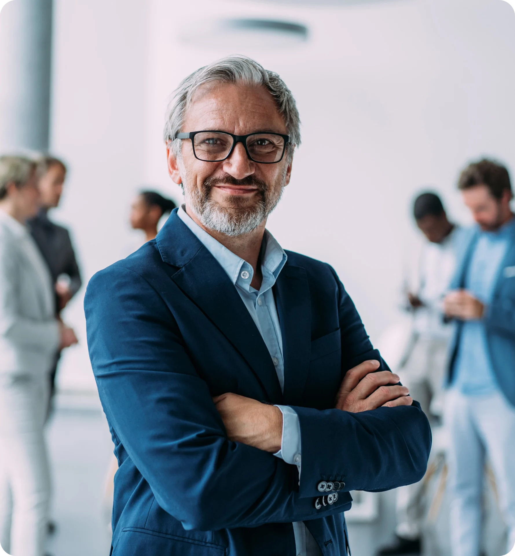 Professional man standing with arms crossed